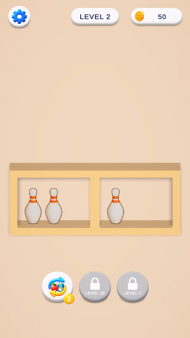 Shelf Trio after three bananas cleared, bowling pins left on the shelves