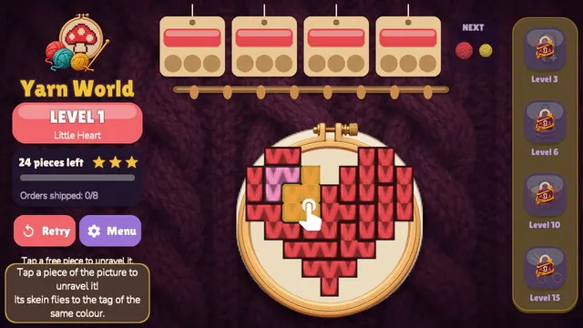 Yarn World: the knitted heart in its hoop with four order tags